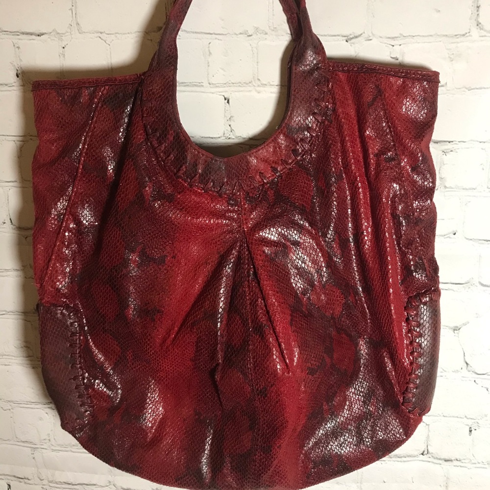 Chico’s snake pattern bag.